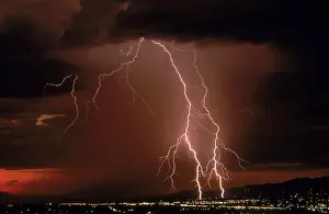 Storms: Cloud-to-Ground lightning during a summer storm in Tucson, A