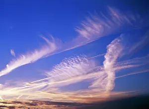 Aeroplane: Clouds - aircraft vapour trails at sunset