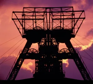 Mining: Coal, conveyor tower, in the sundown, dusk, industrial