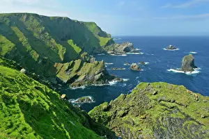 Hermaness: Coastal Scenery - steep, jagged cliffs and sea