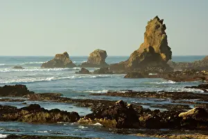 Ragged: Coastline rock formations - ragged sea stacks and