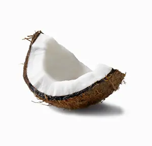 Agai: Coconut, Cocos nucifera, segment with shell with shadow agai