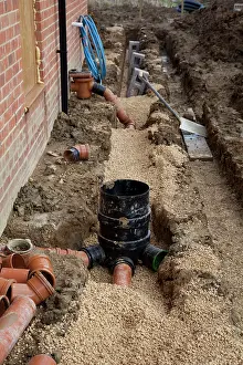 Ecologically: Colemans Hill Farm new eco build laying drainage pipes