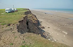Collapsing: Collapsing tarmac road at cliff edge on coast road