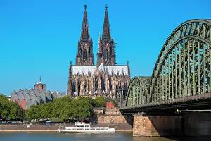 Churches: Cologne Cathedral with Hohenzollern bridge and Philharmonie