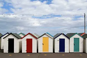 Features: Colorful bath houses in Paignton in England Devon