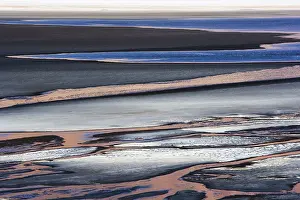Antofagasta: Colorful mineral patterns on edge of salt lake