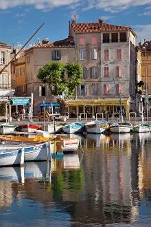 Dock: Colorful Sailboats in the small harbor of
