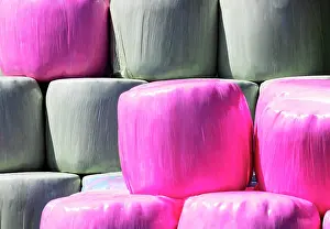 Upper: Colourful hay bales in the meadow near the village o