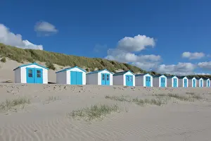 Huts: Colourful huts at the beach - island of Texel -