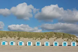 Huts: Colourful huts at the beach - island of Texel -