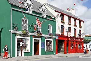 Gastronomy: Colourful painted pubs, Dingle, Kerry, Ireland