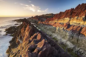 Norwegian: Colourful rocks on the coast, Varanger