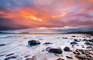 Citrus: Colourful sunset on a stone beach near Achiltibuie on the we