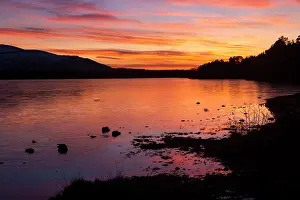 Morlich: The colours of sunset are reflected in the frozen waters of