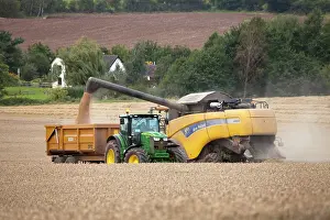 Trailer: Combine Harvester - emptying grain into trailer