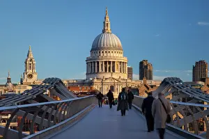 Commuters: Commuters walking to work across the Millennium