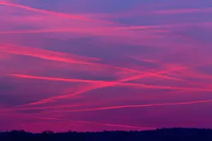 Aeroplane: Condensation / Vapour Trails - from airliners at dusk