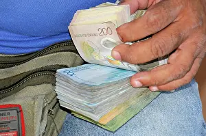 Stacked: Cordoba banknotes from a money changer, currency