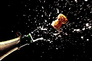Celebrations: Cork popping from a champagne bottle