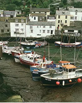 Yachts: CORNWALL - Polperro Harbour. Fishing boats at low tide