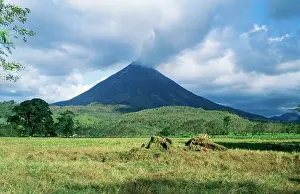 Arenal: Costa Rica - Arenal Volcano, steam forming on peak