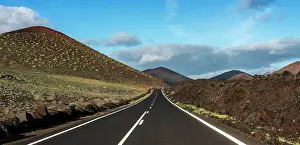 Canary: Country road between volcanic landscape, Lanzarote