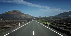 Canary: Country road between volcanic landscape, Lanzarote
