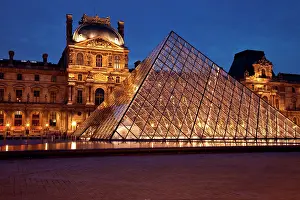 Pyramid: Courtyard of Musee du Louvre at twilight
