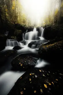 Valleys: Couzon waterfalls in the Darots Valley in autumn