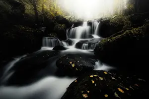 Valleys: Couzon waterfalls in the Darots Valley in autumn