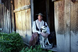 Cattleman: Cowboy - sitting with Border Collie