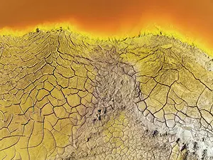 Mines: Cracked earth at the bank of the Rio Tinto (Red