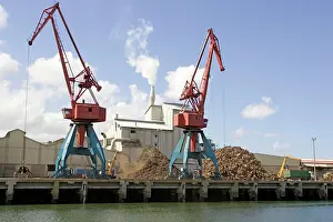 Lorry: Cranes on quayside unloading scrap metal into trucks