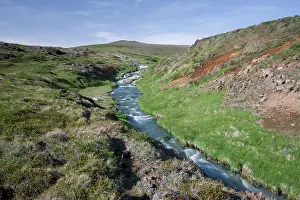 Flows: A creek warmed by hot springs flows near