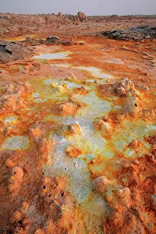 Depression: Dallol hot spring with salt concretions coloured