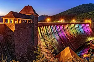 Economy: Dam in the evening light, rainbow-coloured colourful