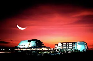 Crescent: Darwin Casino at night with crescent moon