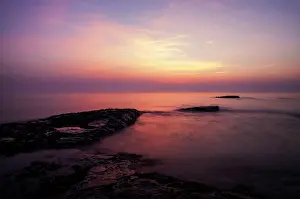 Bamburgh: Dawn colours along Bamburgh beach
