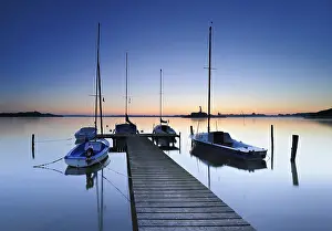 Boats: Dawn on the Schaalsee, wooden jetty with sailing boats