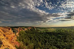 North Dakota: Days last light on the red cliffs of the Little Missouri