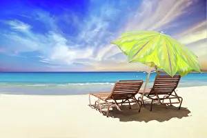 Yacht: Deckchairs and parasol on the Caribbean beach, A