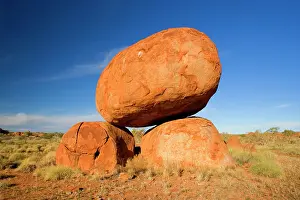 Situated: Devils Marbles - a balanced rock of red granite