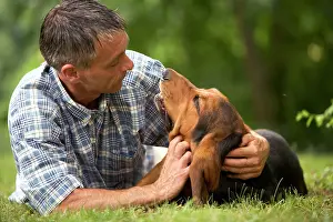Stroking: Dog - Basset Hound with owner