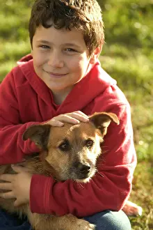 Mongrels: Dog - Boy holding Mongrel