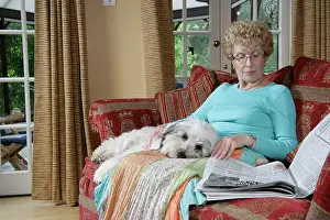 Owners: DOG - with it's head on owner's lap