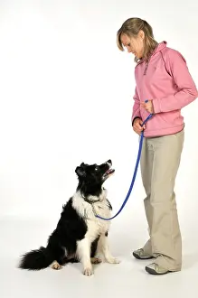 Older: Dog. Women with older dog on lead