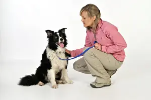 Older: Dog. Women with older dog on lead