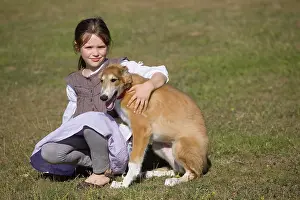 Borzoi: Dog - young girl cuddling Borzoi