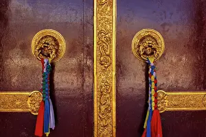 Pradesh: Door handles in Buddhist monastery gompa. Mud vi